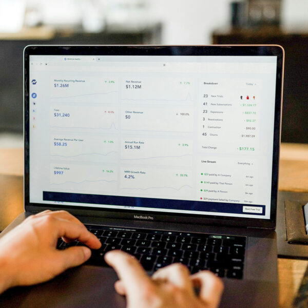 Man using laptop to look at internal accounting controls